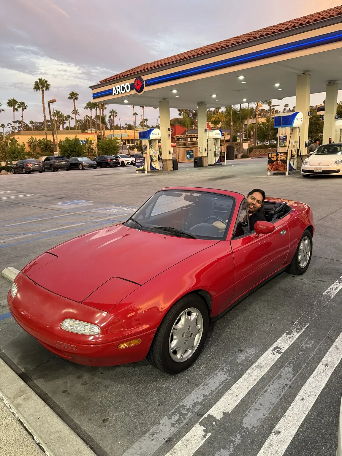 Stopping for fuel at dusk during the drive home